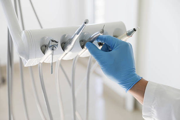 Professional Tooth Extraction technician working in Ham Lake, MN